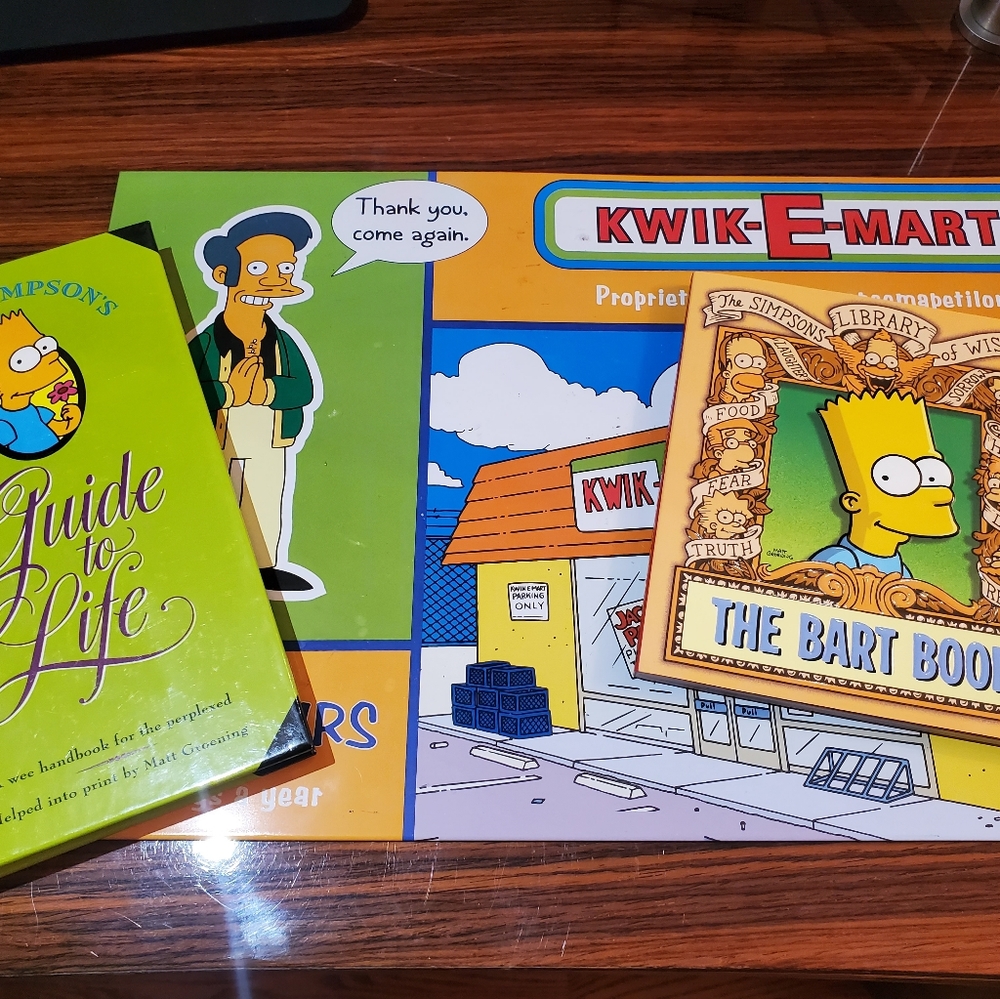 Simpson stuff...2 books and a tin placemat ..super sweet score
